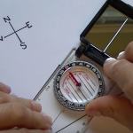 How to orient a map and take a bearing with a compass.